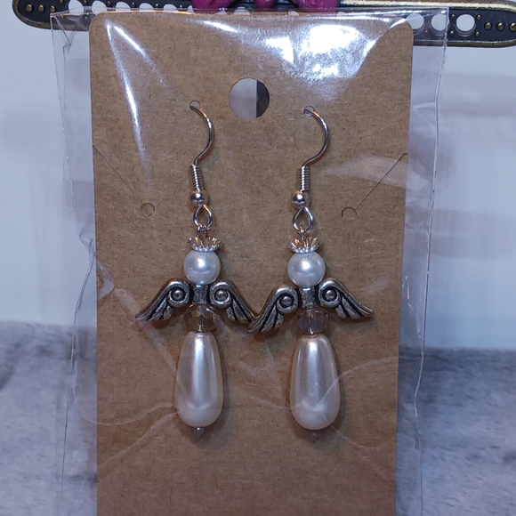 Earrings: Ivory tear drop pearl Angel on silver earwires. - Picture 5 of 5